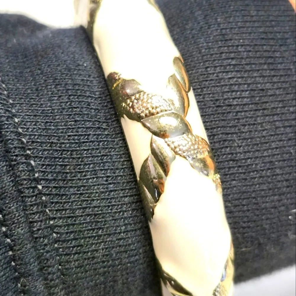 Cream white and gold toned bangle bracelet